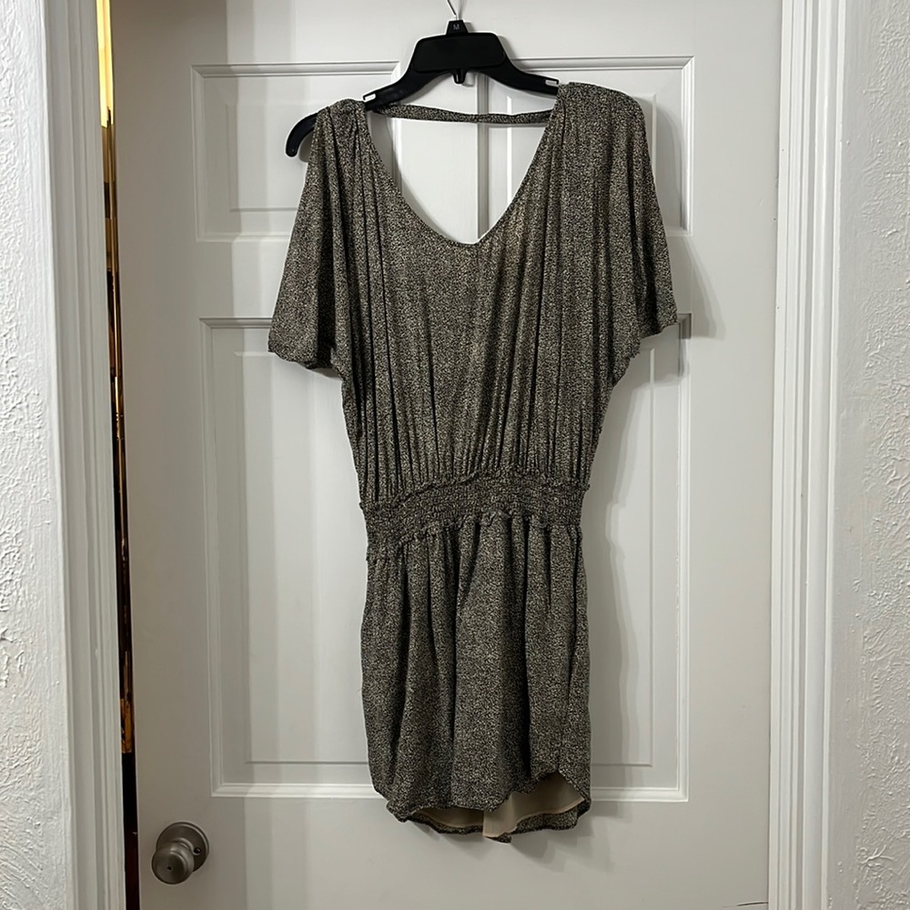 BCBGeneration dolman sleeve black and cream mini dress with open swag back.